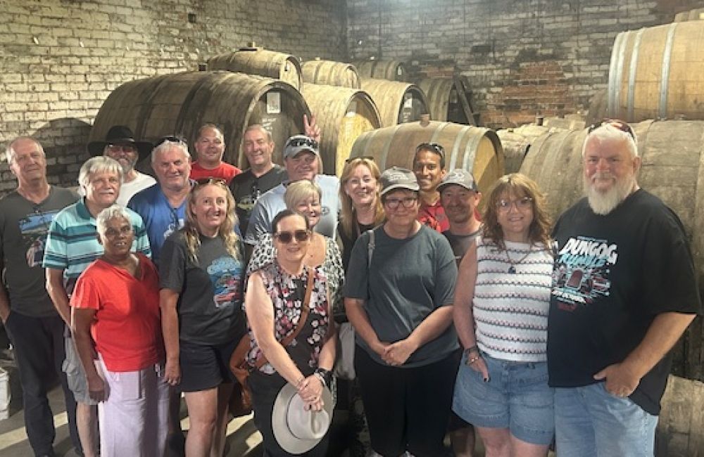 Group photo in the Barrel room 2026